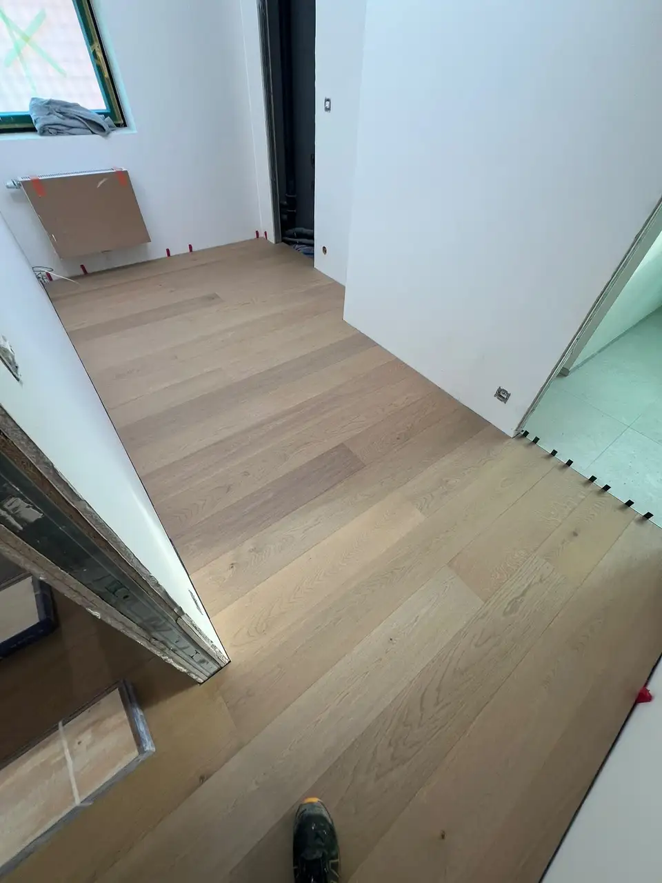 Après : Couloir, pose du parquet, Woluwe-Saint-Pierre